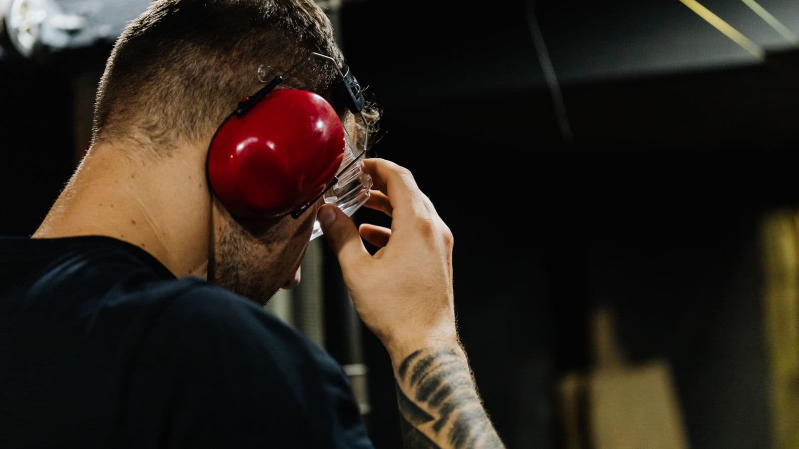 Worker hearing protection audiometric test being administered in an industrial setting